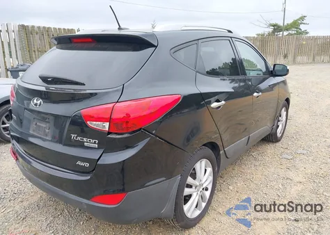 2012 Hyundai Tucson Limited from USA, damaged, VIN KM8JUCAC7CU541123